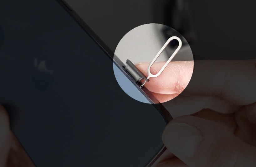 Push the paperclip or SIM card eject tool until the SIM card tray pops out.